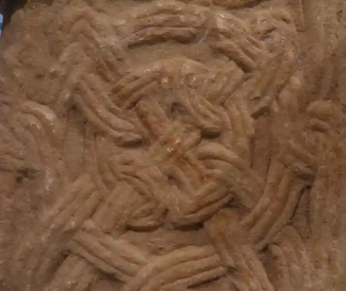 Cross in the center of a brick